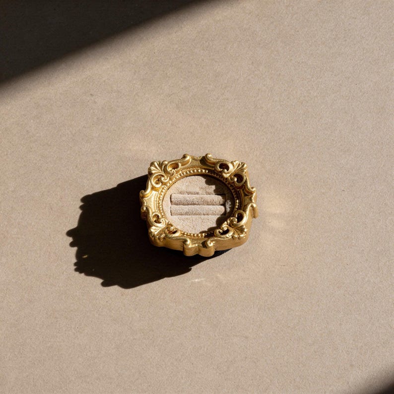 Velvet ring holder with vintage gold frame, engagement ring display. Ring box in multiple colors for wedding and jewelry photography