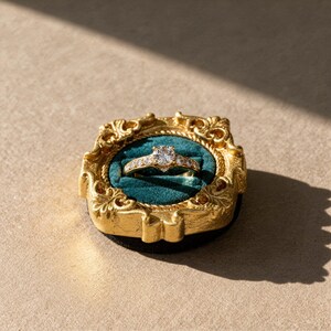 Velvet ring holder with vintage gold frame, engagement ring display. Ring box in multiple colors for wedding and jewelry photography