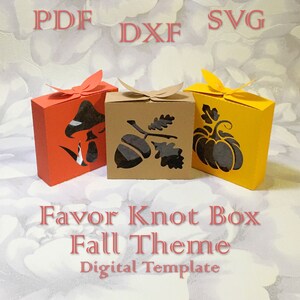 May include: Three colourful favour boxes with autumn-themed cutouts: a mushroom, acorns, and a pumpkin. The boxes are orange, brown, and yellow, with matching paper bows. Text on the image reads "PDF, DXF, SVG, Favor Knot Box, Fall Theme, Digital Template."