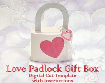 May include: A white padlock-shaped gift box with a pink heart cutout and a silver handle. The box has a small pink heart charm attached to a silver key. The text "Love Padlock Gift Box" is written in red letters below the box. The text "Digital Cut Template with instructions" is written in black letters below the red text.