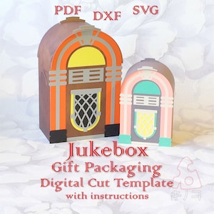 May include: Two vintage-style jukebox gift boxes, one larger than the other, with a red, yellow, brown, and gray color scheme. The boxes are made of paper and are designed to be cut out and assembled. The text "Jukebox Gift Packaging Digital Cut Template with instructions" is printed below the boxes.
