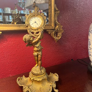 Antique Ansonia &quot;Marcela&quot; Mantle Clock, Made in the USA circa 1914, Gilded Metal with Fine Chasing, Enameled Clock Face, Cherub on Shell