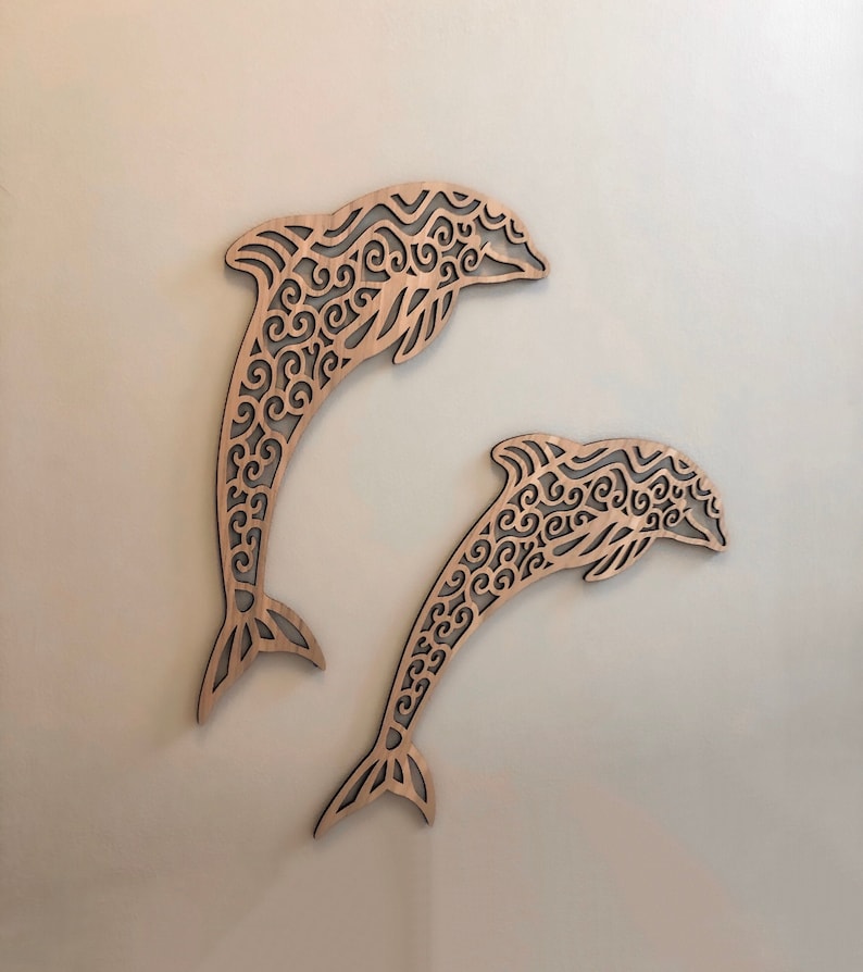 Intricately Cut Wooden Dolphins