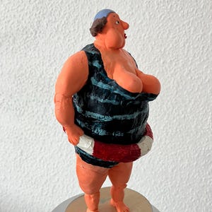 Paper mache figure of a confident woman, swimmer paper mache figure, paper mache figure of an athlete