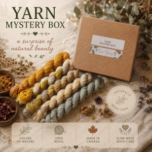 May include: A brown cardboard box labelled YARN MYSTERY BOX with five twisted skeins of yarn in shades of mustard yellow, cream, and sage green. The box features a sticker with the text Eco Yarn and the phrase a surprise of natural beauty.