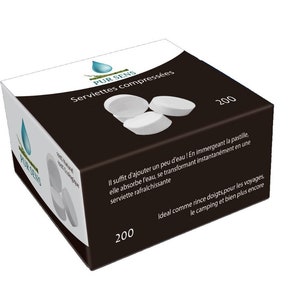 Puede incluir: Una caja de 200 toallitas blancas comprimidas. La caja es negra con texto blanco que dice "PUR SENS Serviettes compressées 200". El texto en la caja dice "Il suffit d'ajouter un peu d'eau! En immergeant la pastille, elle absorbe l'eau, se transformant instantanément en une serviette rafraîchissante. Ideal como paño para limpiar los dedos, para viajes, acampar y mucho más."