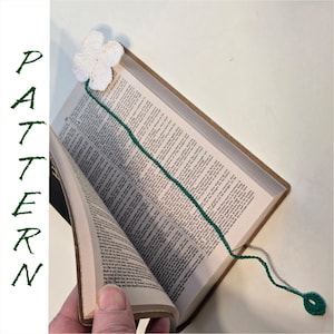 May include: A rustic wooden sign with the text "Welcome to our home" in white lettering. The sign features a distressed finish and a simple, inviting design, perfect for entryway decor.