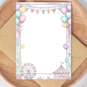 May include: A carnival-themed stationery set with pastel balloons, a Ferris wheel, and a circus tent design. The stationery is presented on a wooden tray with a brown envelope. The text "FairyTaleTRADEco" is at the bottom of the stationery.