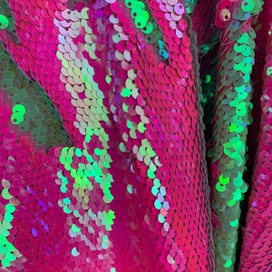 Neón green/pink reversible sequin fabric on one Way Stretch fabric sold by the yard