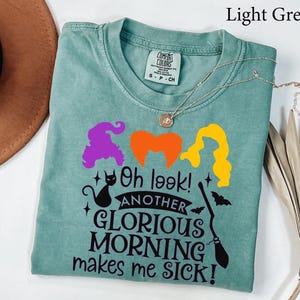 May include: A set of three ceramic vases in varying heights and shapes. The vases are glazed in a matte white finish, offering a minimalist aesthetic. The tallest vase is approximately 10 inches high.