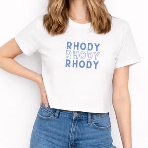 May include: A rustic wooden sign with the text "Welcome to our home" in a handwritten style. The sign is rectangular, with a distressed finish, and features a simple, inviting design. It's suitable for indoor or outdoor use.