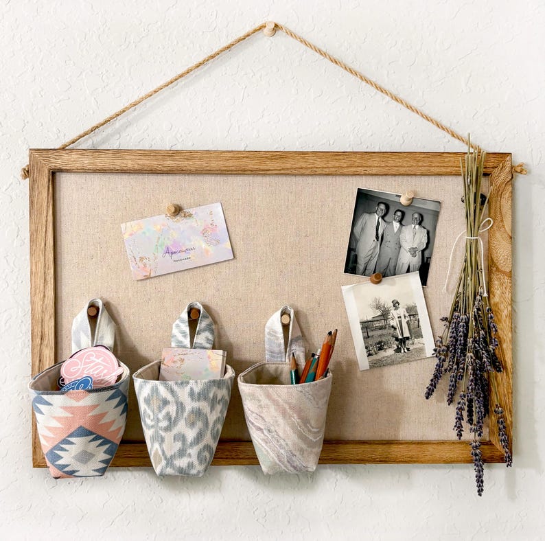 May include: A rustic wooden sign with the text "Welcome to our home" in white lettering. The sign has a distressed finish and a simple, inviting design, suitable for a front porch or entryway.