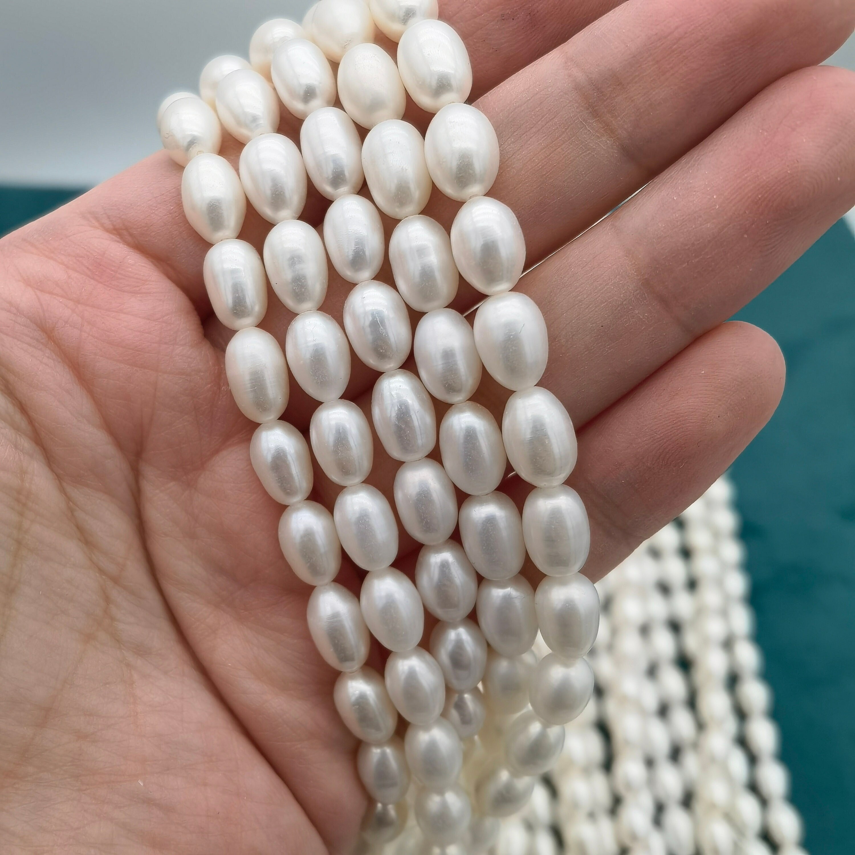 Wholesale Near Round White Natural Freshwater Pearl A / AA / AAA