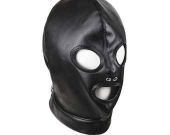 Blonde german girl in black leather bondage gear with gimp mask