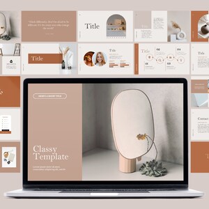 May include: A laptop computer displaying a presentation template with a minimalist design. The template features a light brown background with a large oval mirror and a small succulent plant. The text "Classy Template" is displayed in a bold font.