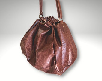 Handmade Brown Leather Drawstring Pouch: Adjustable Shoulder Bag