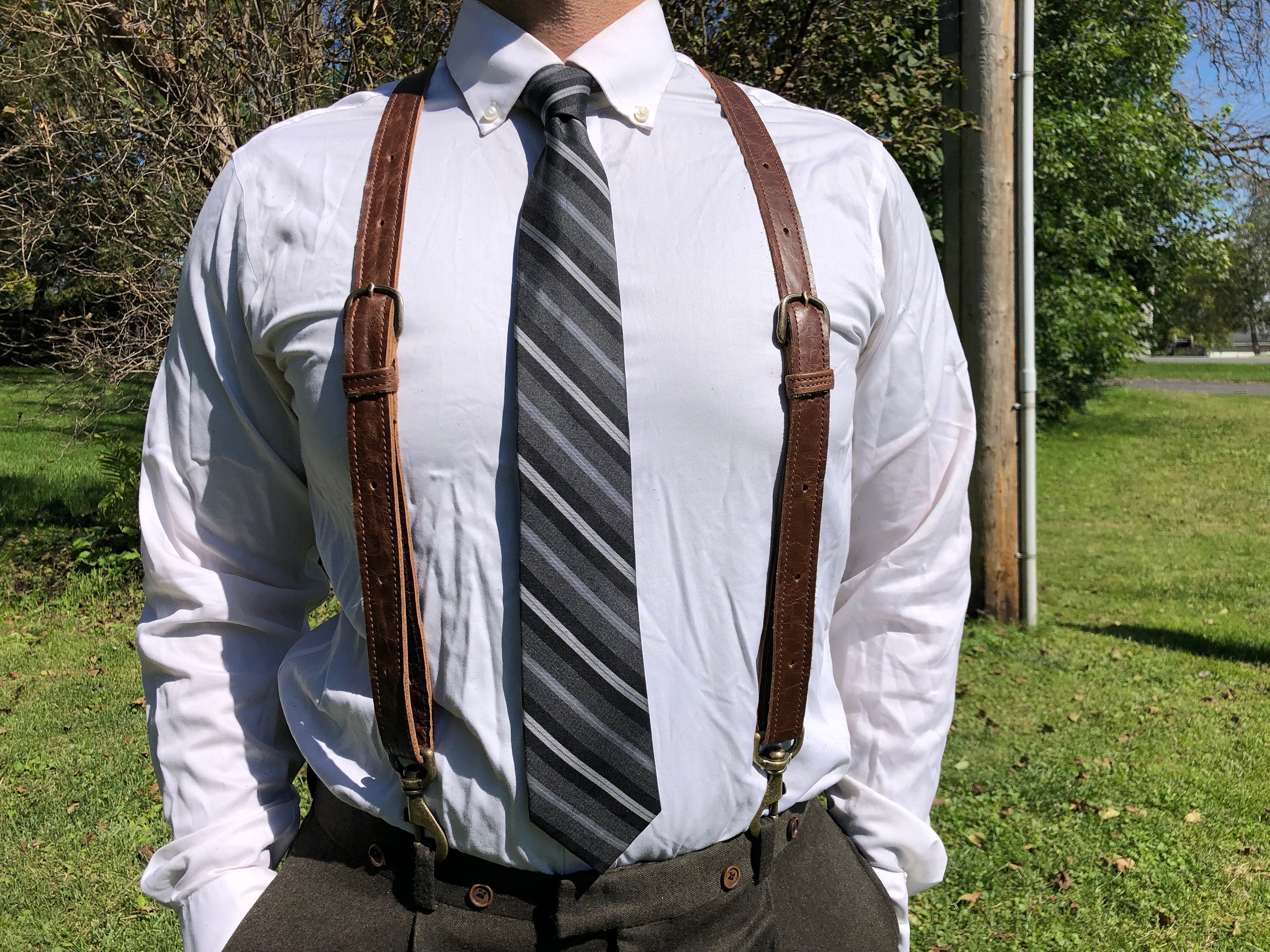 thumbnail interactive-video image 1 of Mars Suspenders Men's Y-Style Leather Suspender - USA Made, Fake Leather, Snaps/Clips/Button (Black, Brown, Tan) 1 of 4