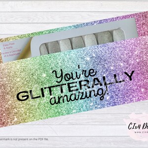 May include: A rainbow glitter background with the text "You're GLITTERALLY amazing!"  A clear plastic package of nail polish wraps is visible in the upper right corner of the image.