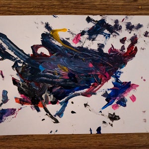 May include: Abstract painting on white paper with bold strokes of blue, black, pink, red, and yellow paint.