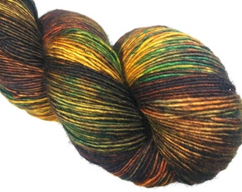 Forest Cathedral: rich browns, gold, bronze, rust, green on  -  100% Superwash Merino Single Ply Fingering