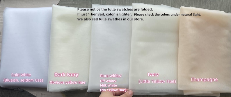 May include: Five folded tulle fabric swatches arranged side-by-side in shades of cold white, dark ivory, pure white, ivory, and champagne. Text on the image notes that swatches are folded and colors appear lighter in single-tier veils.