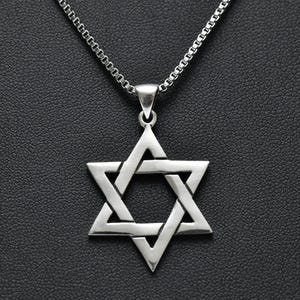 May include: A silver Star of David pendant necklace with a chain.