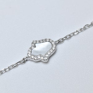 Dainty Sterling Silver Hamsa Bracelet: White Gemstone Hand of Fatima