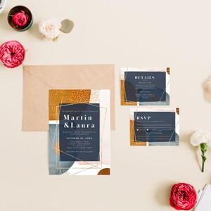 May include: A wedding invitation suite with a modern abstract design. The invitation features a gold geometric frame with the names "Martin & Laura" and the date "October 10, 2020". The details card includes information about the reception and registry. The RSVP card has a space for guests to indicate their attendance.
