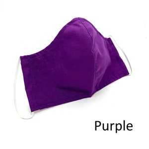 May include: Purple face mask with white elastic ear loops.