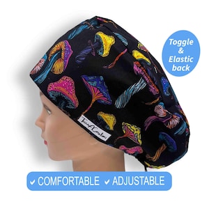 May include: Black scrub hat with a colourful mushroom print. The hat has an adjustable toggle and elastic back. "Tiana Creations" is printed on the hat.  "COMFORTABLE" and "ADJUSTABLE" are printed below the hat.