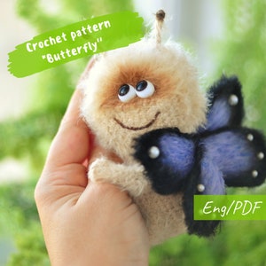 May include: Crochet pattern for a brown and beige fuzzy butterfly with blue wings. The pattern is available in English and PDF format. "Crochet pattern "Butterfly" "