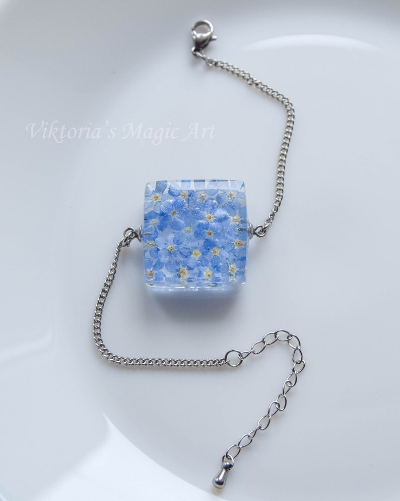 Real flower jewelry. Botanical bracelet handmade with eco epoxy resin Embedded in resin live plants a real Blue Forget-me-nots flowers