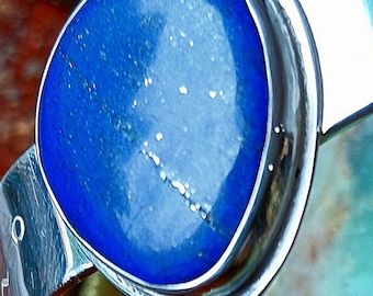 Beautiful royal blue gem lapis bracelet with many fine pyrite sparkles. Handmade in Mendocino by musician silversmith. Natural, untreated