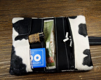 Tobacco pouch made of imitation cowhide with zippered pocket for filters with rubber or snap closure; climate-neutral shipping; very little waste