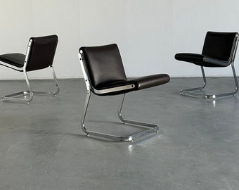 1 of 3 Italian Space Age Cantilever Lounge Chairs in Chromed Steel and Faux Leather, in Style of Gastone Rinaldi, 1970s
