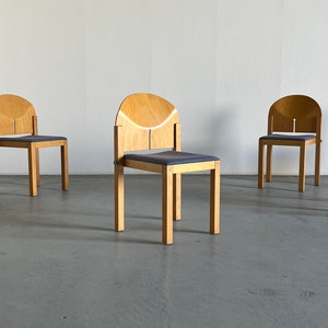 1 of 6 Postmodern Sculptural Wooden Stackable Dining Chairs by Arno Votteler for Bisterfeld and Weiss, Germany 1980