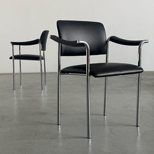 1 of 2 Vintage Dining Chairs in Black Faux Leather, Plastic and Chromed Tubular Steel, 1980s Italy