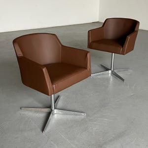 1 of 2 Vintage Mid-Century Modern Swivel Armchairs in Brown Faux Leather and Chromed Steel, 1980s Austria