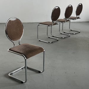 1 of 4 Vintage Postmodern Cantilever Dining Chairs with Circular Backrests in Patterned Upholstery and Chromed Tubular Steel, 1980s Italy