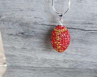 Kansas City Chiefs Red and Gold Swarovski Crystal Football Pendant set in 925 Sterling Silver on a 18&quot; Sterling Silver Chain ( 1 1/4&quot;H )