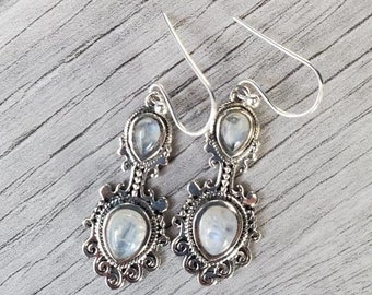 Sterling Silver & Double Moonstone Earrings In An Intricate Scroll Setting