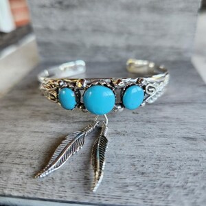 Awesome Sterling Silver Southwestern Style Cuff Bracelet With Three Turquoise Stones & 2 Sterling Silver Dangling Feathers