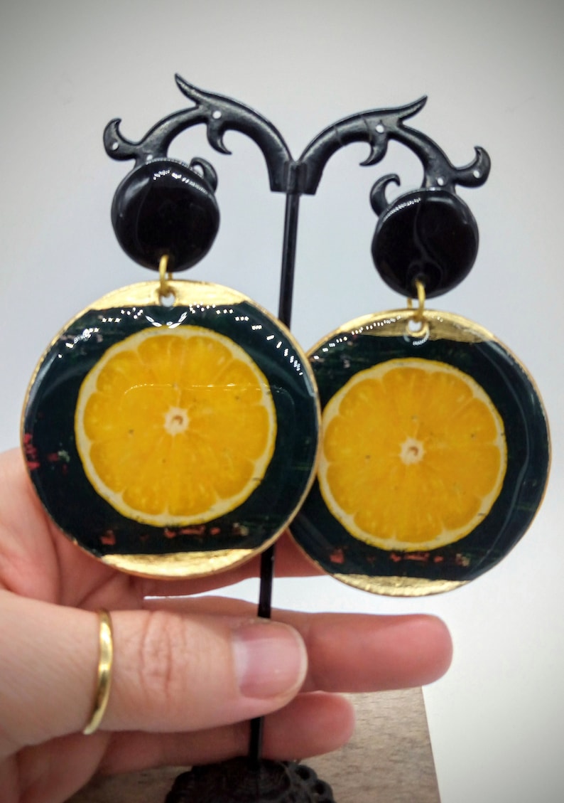 Large earrings with oranges Chic gift. Shiny earrings in epoxy Black and gold earrings Round mobile pendant earrings