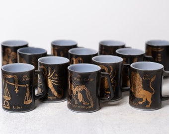 Set of 12 Federal Milk Glass Astrology Zodiac Mugs with Black and Gold Design 1970&#39;s Sold Individually