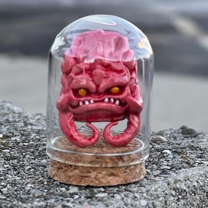 chewed bubble gum monster which resembles Krang