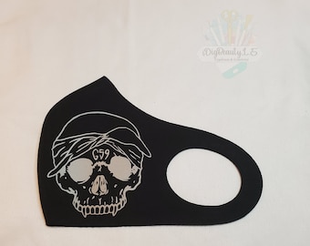 May include: Black face mask with a white skull graphic wearing a bandana with the text "G59" printed on it.
