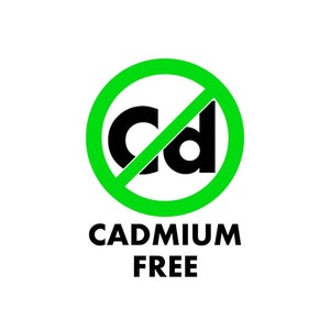 May include: Green circle with a diagonal line through it, with the letters "Cd" inside. The text "CADMIUM FREE" is below the circle.
