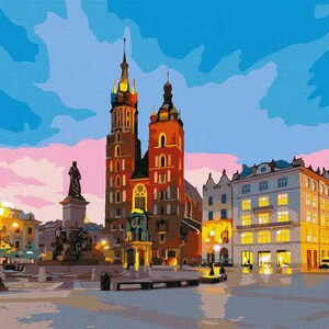 May include: A painting of a city square at dusk with a large church in the background. The church has two tall spires and is lit up with warm yellow lights. There are several buildings in the foreground, including a statue of a man on a pedestal. The sky is a soft pink and blue.