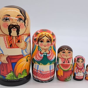 Ukrainian family matryoshka nesting dolls handmade in Ukraine Home decor Wooden toy 7&quot; tall 5 in 1