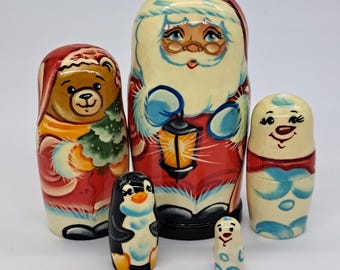 4" Santa Nesting dolls Christmas Matryoshka 5 in 1 Hand made in Ukraine Artwork Wooden toy Stacking dolls Ukrainian art Holiday decor
